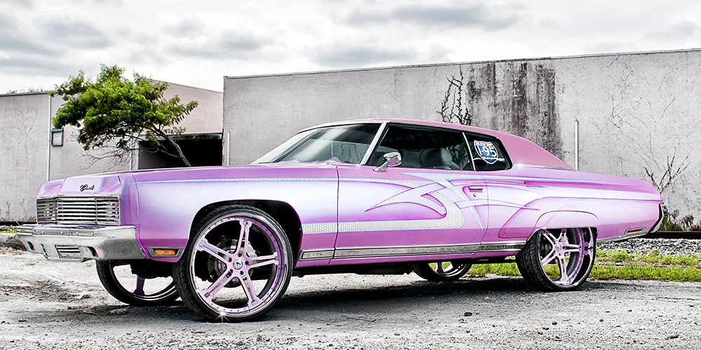 Chevrolet Donk on Forgiato Martellato wheels