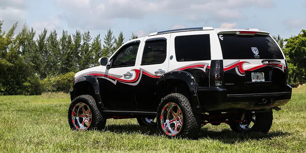 Chevrolet Tahoe on Forgiato Sporcizia-T wheels